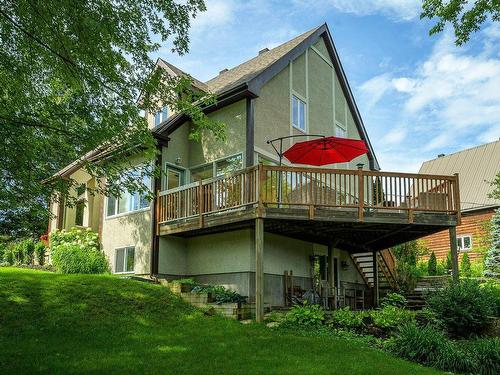 Back facade - 126 Ch. Des Geais-Bleus, Piedmont, QC - Outdoor With Deck Patio Veranda With Exterior