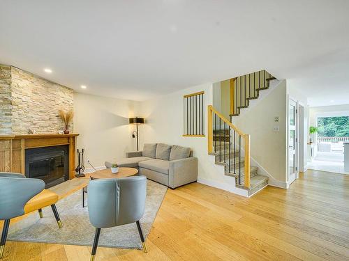 Overall view - 126 Ch. Des Geais-Bleus, Piedmont, QC - Indoor Photo Showing Living Room With Fireplace