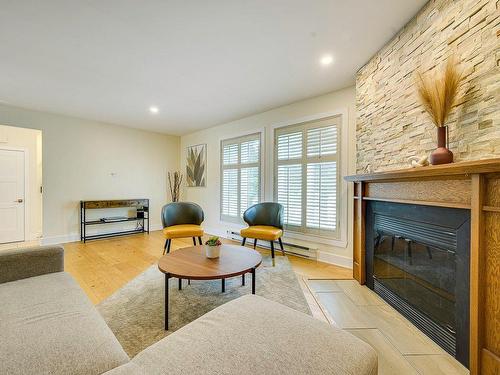 Living room - 126 Ch. Des Geais-Bleus, Piedmont, QC - Indoor Photo Showing Living Room With Fireplace