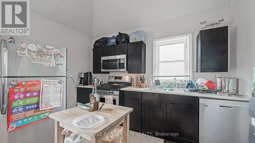 223-227 Gilmore Road, Fort Erie, ON - Indoor Photo Showing Kitchen With Double Sink