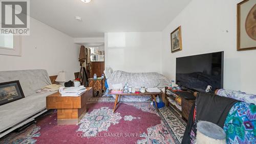 223-227 Gilmore Road, Fort Erie, ON - Indoor Photo Showing Living Room With Fireplace