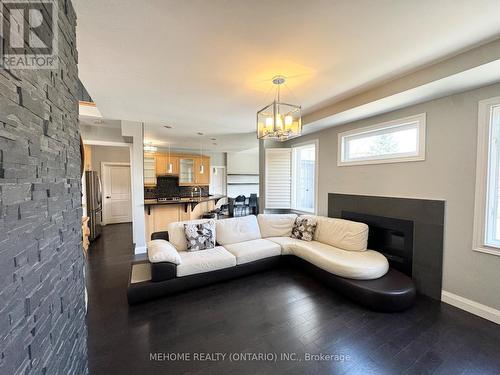 9 Ridgecrest Road, Markham (Berczy), ON - Indoor Photo Showing Living Room With Fireplace