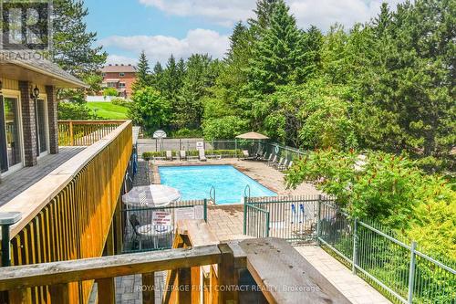 104 - 25 Meadow Lane, Barrie, ON - Outdoor With In Ground Pool With Deck Patio Veranda