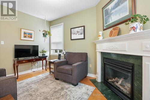 14 Meyer Avenue, Barrie, ON - Indoor Photo Showing Living Room With Fireplace