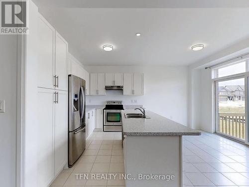 11 Copperhill Heights, Barrie (Painswick South), ON - Indoor Photo Showing Kitchen With Double Sink