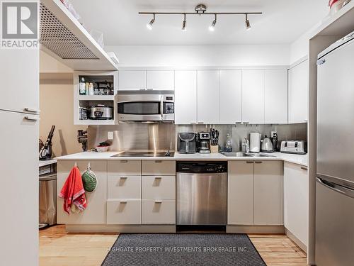 619 - 111 Elizabeth Street, Toronto C01, ON - Indoor Photo Showing Kitchen With Stainless Steel Kitchen With Double Sink