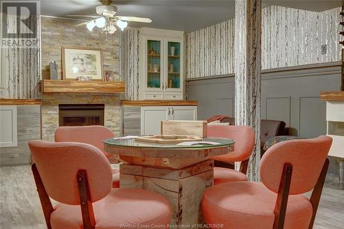 323 County Rd 27 East, Kingsville, ON - Indoor Photo Showing Dining Room With Fireplace