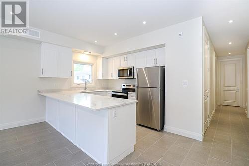 233 Watson Unit# 106, Windsor, ON - Indoor Photo Showing Kitchen With Stainless Steel Kitchen