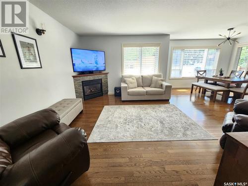 726 Bertrand Avenue, Radville, SK - Indoor Photo Showing Living Room With Fireplace