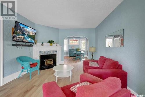 1314 College Avenue, Regina, SK - Indoor Photo Showing Living Room With Fireplace