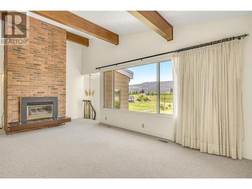 699 Curtis Road, Kelowna, BC - Indoor With Fireplace