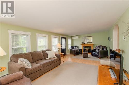 40 Osprey Road, Upper Coverdale, NB - Indoor Photo Showing Living Room With Fireplace