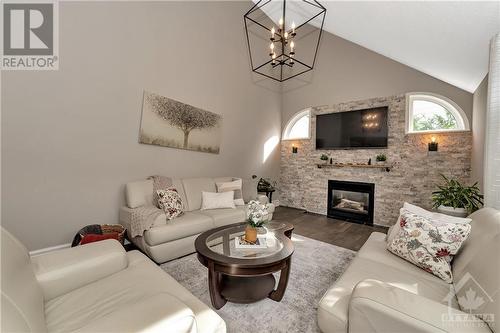 13 Kyle Ave Avenue, Ottawa, ON - Indoor Photo Showing Living Room With Fireplace