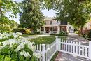 1001 Lawrence Avenue, Kelowna, BC  - Outdoor With Deck Patio Veranda With Facade 