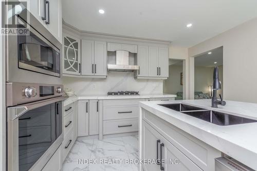 12 Dawnridge Trail, Brampton, ON - Indoor Photo Showing Kitchen With Double Sink