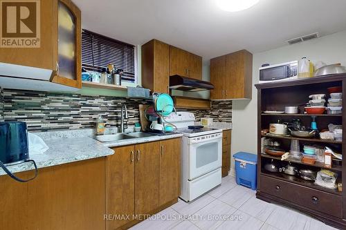 10 Gardentree Street, Toronto E10, ON - Indoor Photo Showing Kitchen With Double Sink