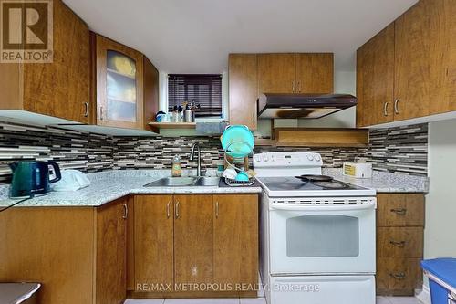 10 Gardentree Street, Toronto E10, ON - Indoor Photo Showing Kitchen With Double Sink