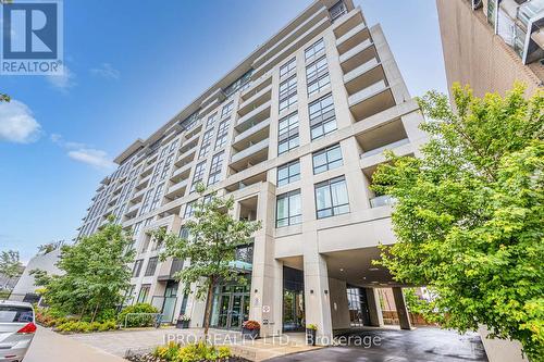 307 - 8 Trent Avenue, Toronto E02, ON - Outdoor With Balcony With Facade