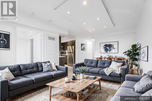 307 - 8 Trent Avenue, Toronto E02, ON - Indoor Photo Showing Living Room
