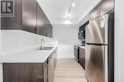 307 - 8 Trent Avenue, Toronto E02, ON - Indoor Photo Showing Kitchen With Stainless Steel Kitchen With Double Sink