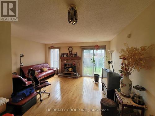 108 Enchanted Hills Crescent, Toronto, ON - Indoor Photo Showing Living Room With Fireplace