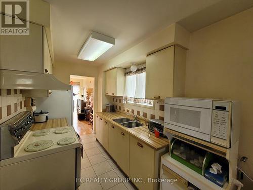 108 Enchanted Hills Crescent, Toronto, ON - Indoor Photo Showing Kitchen With Double Sink