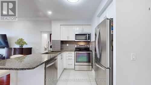 511 - 1 Clairtrell Road, Toronto, ON - Indoor Photo Showing Kitchen With Upgraded Kitchen