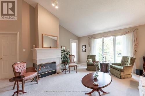 18 - 499 Teeple Terrace, London, ON - Indoor Photo Showing Living Room With Fireplace