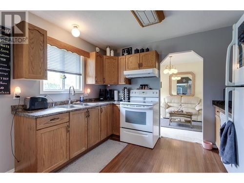 1203 Sanborn Court, Kelowna, BC - Indoor Photo Showing Kitchen With Double Sink