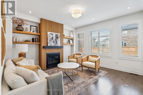 44 Soltys Drive, Whitby, ON - Indoor Photo Showing Living Room With Fireplace