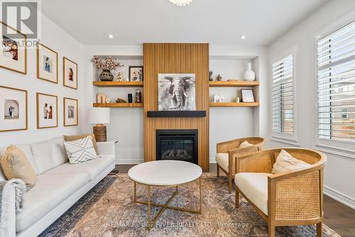 44 Soltys Drive, Whitby, ON - Indoor Photo Showing Living Room With Fireplace