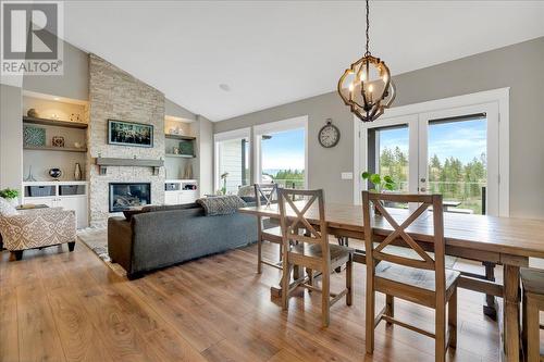 2565 Crown Crest Drive, West Kelowna, BC - Indoor Photo Showing Dining Room With Fireplace