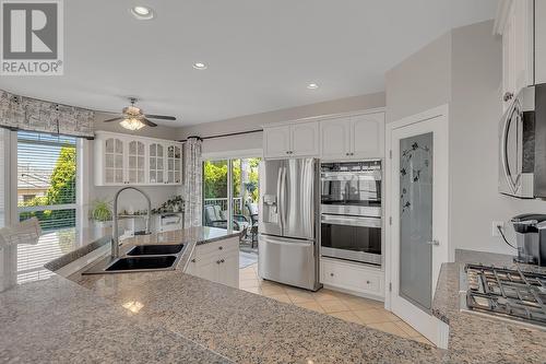 1003 Skeena Drive, Kelowna, BC - Indoor Photo Showing Kitchen With Double Sink