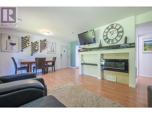 127 Stocks Crescent, Penticton, BC - Indoor Photo Showing Living Room With Fireplace