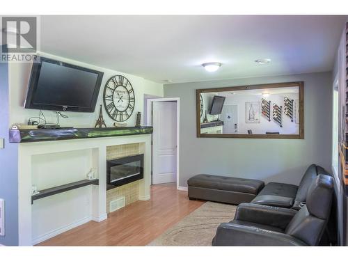 127 Stocks Crescent, Penticton, BC - Indoor Photo Showing Living Room With Fireplace