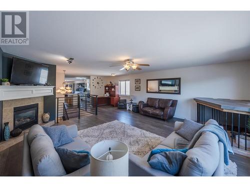 127 Stocks Crescent, Penticton, BC - Indoor Photo Showing Living Room With Fireplace