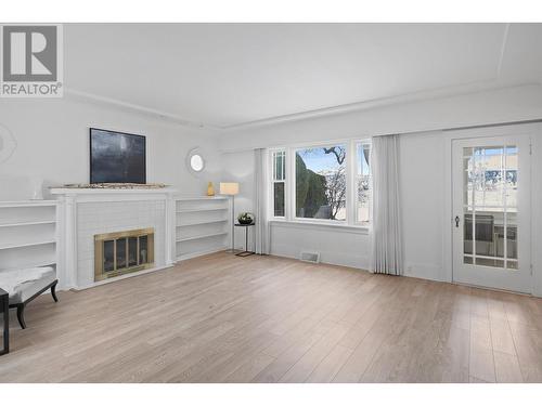 2072 Abbott Street, Kelowna, BC - Indoor Photo Showing Living Room With Fireplace