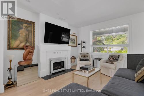 137 Alberta Avenue, Toronto, ON - Indoor Photo Showing Living Room With Fireplace