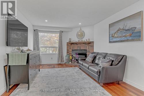 28 Upland Drive, Whitby (Blue Grass Meadows), ON - Indoor Photo Showing Living Room With Fireplace