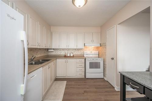 301 Frances Avenue S|Unit #1104, Hamilton, ON - Indoor Photo Showing Kitchen With Double Sink
