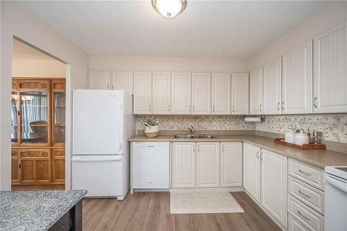 301 Frances Avenue S|Unit #1104, Hamilton, ON - Indoor Photo Showing Kitchen With Double Sink