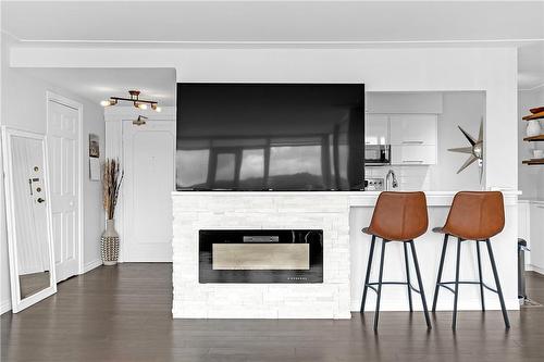 40 Harrisford Street|Unit #706, Hamilton, ON - Indoor Photo Showing Living Room With Fireplace