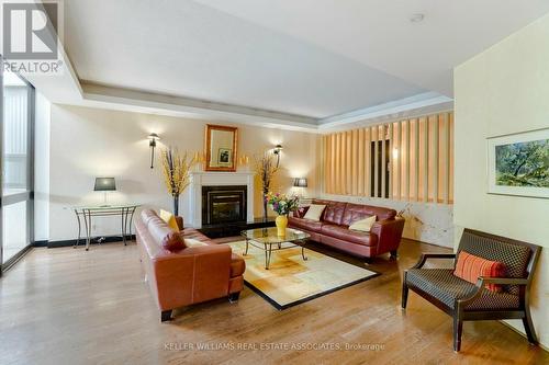 914 - 1333 Bloor Street, Mississauga, ON - Indoor Photo Showing Living Room With Fireplace