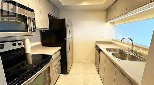 3005 - 77 Harbour Square S, Toronto, ON - Indoor Photo Showing Kitchen With Double Sink