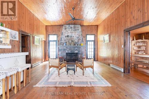 86 East Beach Road, Tiny, ON - Indoor With Fireplace