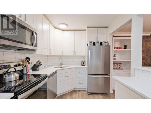 575 Doyle Avenue Unit# 102, Kelowna, BC - Indoor Photo Showing Kitchen With Stainless Steel Kitchen With Upgraded Kitchen