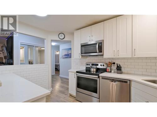 575 Doyle Avenue Unit# 102, Kelowna, BC - Indoor Photo Showing Kitchen With Stainless Steel Kitchen