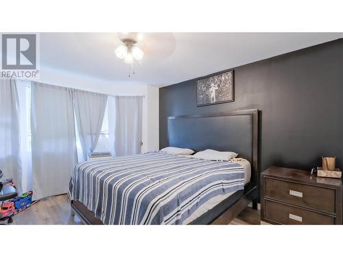 575 Doyle Avenue Unit# 102, Kelowna, BC - Indoor Photo Showing Bedroom