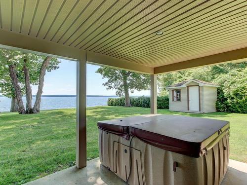 Hot tub - 596 Av. Missisquoi, Venise-En-Québec, QC - Outdoor With Deck Patio Veranda With Exterior