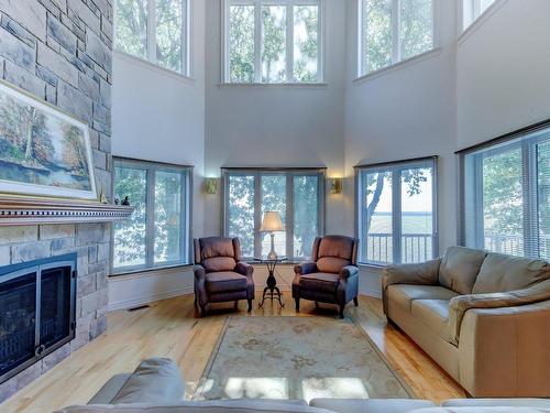 Living room - 596 Av. Missisquoi, Venise-En-Québec, QC - Indoor Photo Showing Living Room With Fireplace